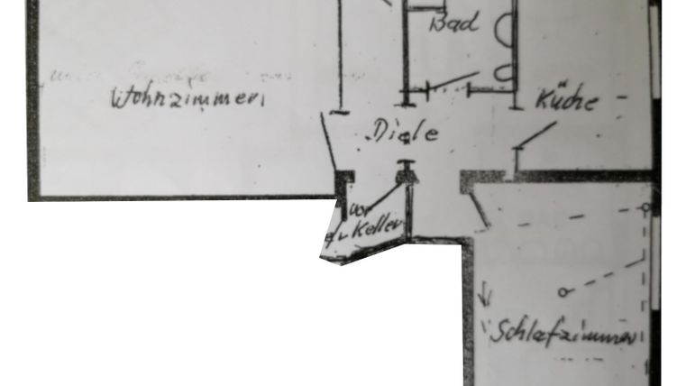 Ein Grundriss eines Wohnraums mit einem Wohnzimmer, einer Küche, einem Badezimmer und einem Schlafzimmer. Die Räume sind durch eine Diele verbunden.